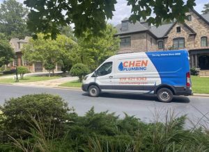 Chen Plumbing Truck Parked On Residential Street