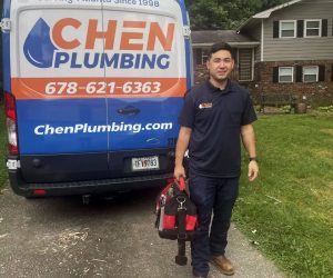 Chen Plumbing Technician At The Back Of Truck